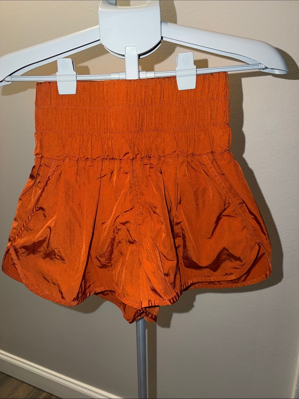 FP Movement by Free People High-Waist Orange Smocked Flared Shorts